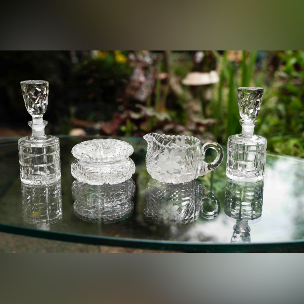 Clear vintage cut glass. Sugar, creamer and cruets. Brand new!!